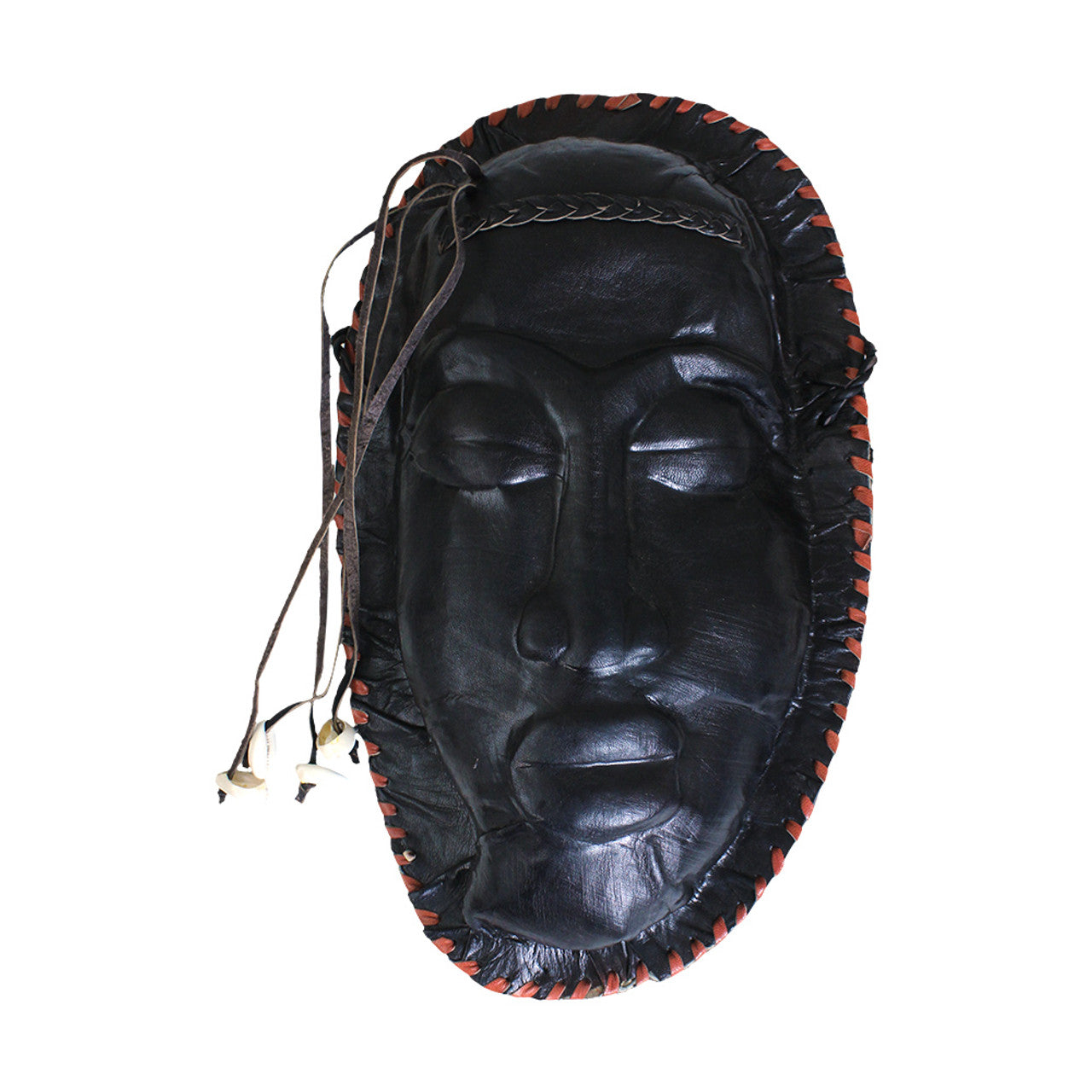 African mask with cowrie shells